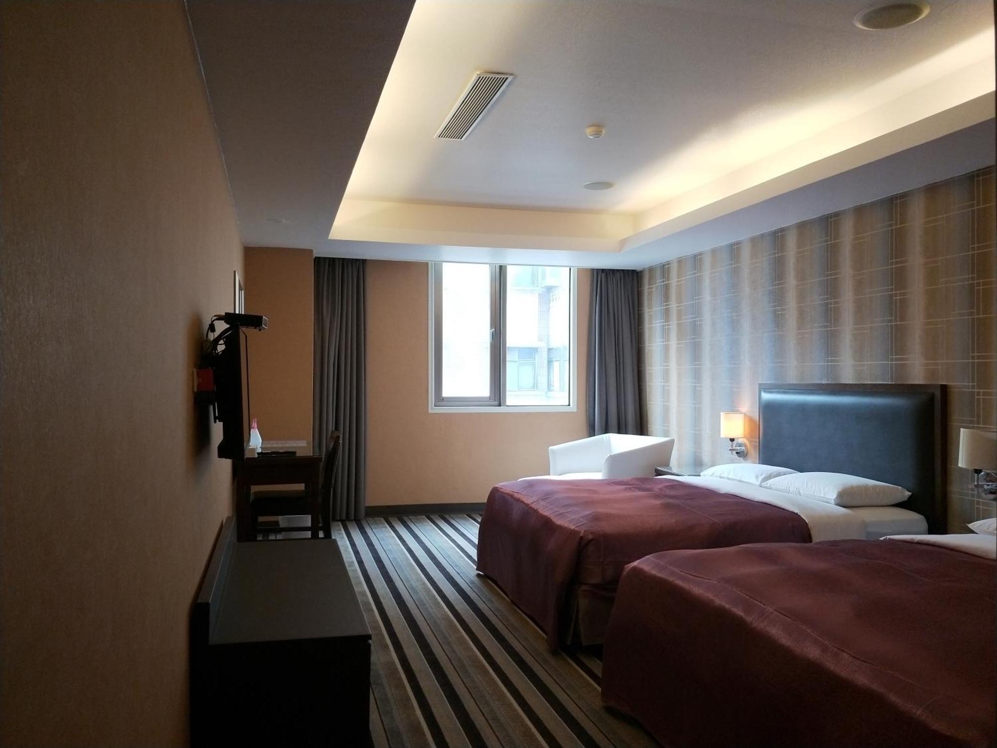 Metropolis Hotel Taoyuan Extérieur photo